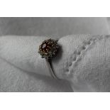 A ruby and diamond cluster ring,