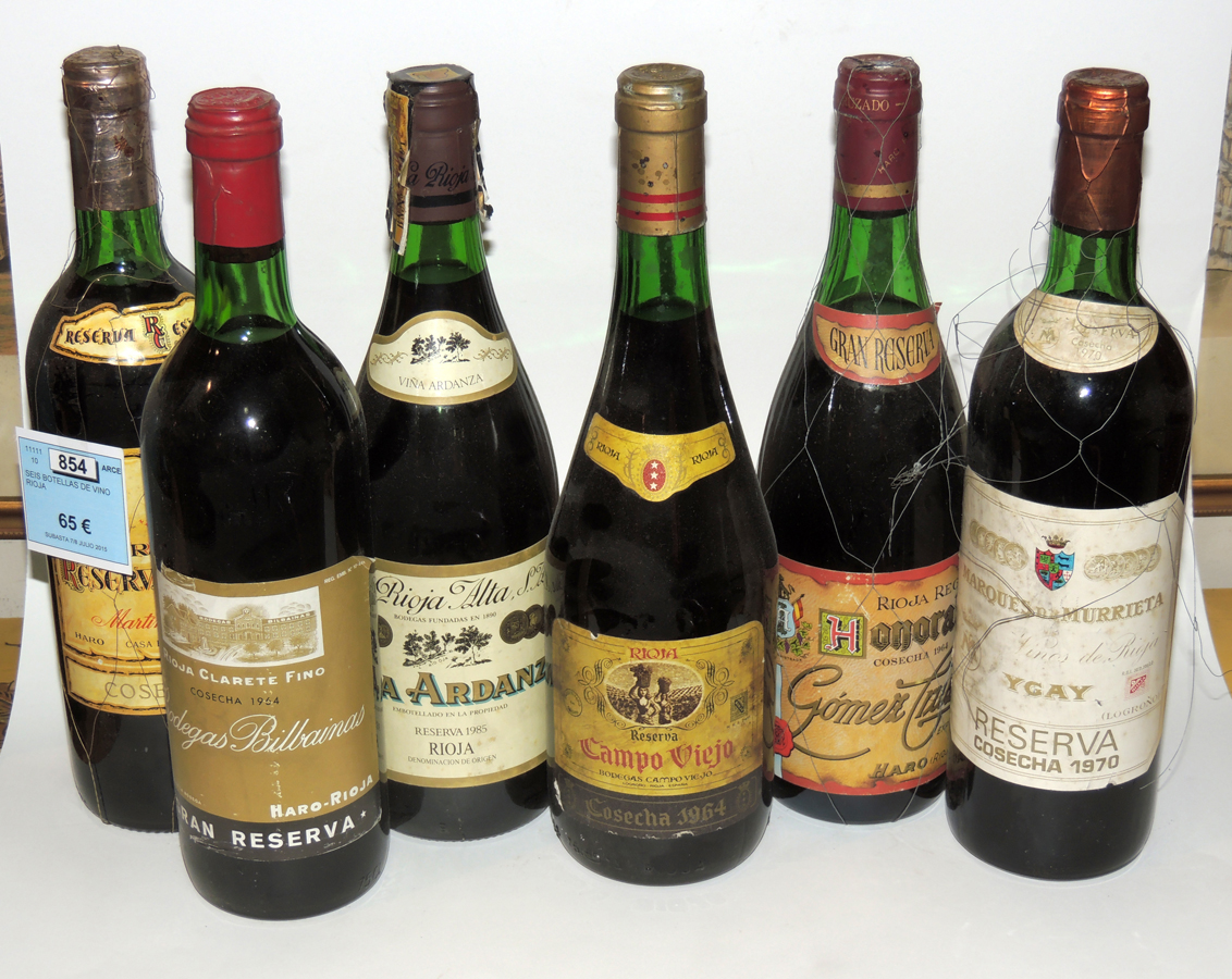 SEIS BOTELLAS DE VINO RIOJA Gomez Cruzado 1964, Campoviejo 1964, Bodegas Bilbaínas 1964, Marqués