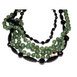 DOS COLLARES Uno con cuentas de jade y el otro en azabache. Starting Price €30