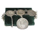 PULSERA de monedas, en plata. Starting Price €40