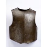 CUIRASS - A BREASTPLATE 1st half 18th century Iron, small holes along the edges, a wide narrow