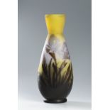 VASE GALLÉ Around 1910, France (Nancy) Opaque yellow and purple glass. Slightly plastic decor of