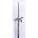 HALBERD 1580-1590, Central Europe Wood, iron, a moon axe, a hook and an axe decorated with cut-out