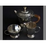 A GEORGE V SILVER THREE PIECE TEA-SET SHEFFIELD 1931 & 1935, R.B.A  comprising of teapot, creamer