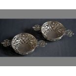 A PAIR OF VICTORIAN SILVER BON-BON DISHES BIRMINGHAM 1893, W.C. with applied caryatid twin-