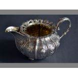 A GEORGE IV SILVER CREAMER LONDON 1821, JOHN BRIDGE C-form applied handle, with applied grape and