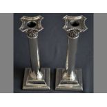 A PAIR OF VICTORIAN SILVER CANDLESTICKS BIRMINGHAM 1893, H.M. removable wax pans, cast acanthus