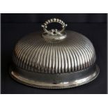 A SILVERPLATE MEAT DOME removable bead edge handle, reeded body with engraved emblem,  terminating