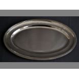 A .800 STD SILVER OVAL PLATTER with decorated border, 34 by 22cm, 312g.