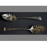 A PAIR OF GEORGE III SILVER BERRY SPOONS DUBLIN 1801, RICHARD WILLIAMS handles engraved with scrolls