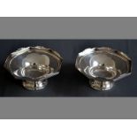 A PAIR OF GEORGE VI SILVER PEDESTAL BOWLS BIRMINGHAM 1945, DEAKIN & FRANCIS LTD. raised rims,