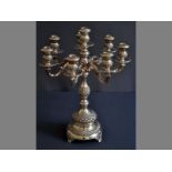 A STERLING SILVER EIGHT LIGHT CANDELABRUM with seven fixed arms, removable candleholders and wax