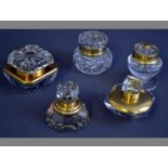 A COLLECTION OF FIVE 19TH CENTURY CUTGLASS BRASS MOUNTED  INKWELLS of various forms, (5).