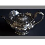 A WILLIAM IV SILVER TEAPOT LONDON 1833, BENJAMIN SMITH III hinged cover with applied floral