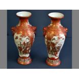 A PAIR OF 19TH CENTURY JAPANESE KUTANI VASES of baluster form with panels of ladies and their