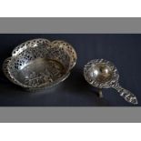 A DUTCH SILVER BON-BON DISH, CIRCA 1945 centre well embossed with a tavern scene, the sides with