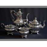 A VICTORIAN FOUR PIECE SILVER TEA AND COFFEE SET SHEFFIELD 1893, S.A.G. comprising of a teapot,