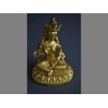 AN 18TH/19TH CENTURY CHINESE GILT BRONZE SEATED BUDDIST FIGURE the female Bodhisattva seated atop