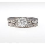 Neil Lane Diamond Engagement Set 14k white gold ring set with a round brilliant cut diamond,
