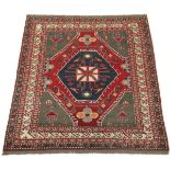 Kazak Style Carpet, 20th Century 7'3" x 6'3-3/4"Wool on weft, knotted fringe on both ends, medium to