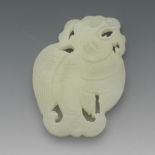 Carved Jade Ornament of a Mythical Creature 2-3/8" x 1-3/4"A flat carved ornament of a creature with