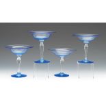 Four Blue Glass Compotes nullFour clear blue and clear blown glass compotes in a shape by Steuben,