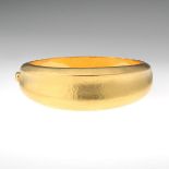 Italian Gold Bangle Bracelet  2-1/4 in. within bangle, 1 inch across the top18k yellow gold hinged