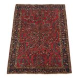 Sarouk Carpet, 20th Century 5' x 3'6"Low dense wool pile on cotton weft. Field with central