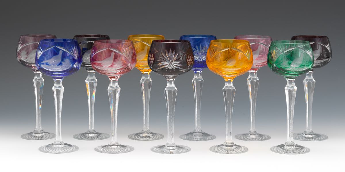 Eleven Bohemian Cut Back Wine Goblets 7-1/2"Of various colorations, tall cut crystal wine goblets