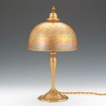 Tiffany Furnaces Art Deco Desk Lamp 15-1/4" x 8" shadeGilt bronze and favrile glass table lamp. Gold
