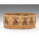 Tohono O'odham Basket, ca. 1940 9-7/8" x 13-1/4" x 5-1/2"Ovoid hand crafted basket with repeating