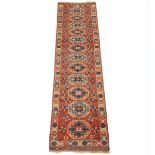 Kazak Runner, 20th Century 11'6" x 2'11"Wool on natural wool weft, having kilim ends, knotted.