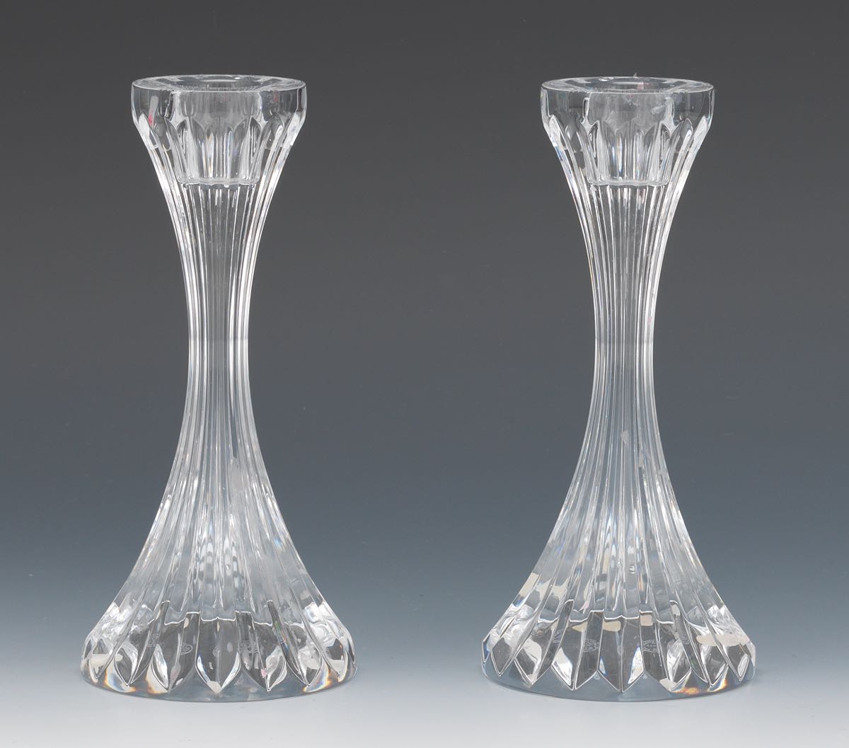 A Pair of Baccarat Candlesticks 6-1/8"Modern tapering shape with furrowed sides, Baccarat logo