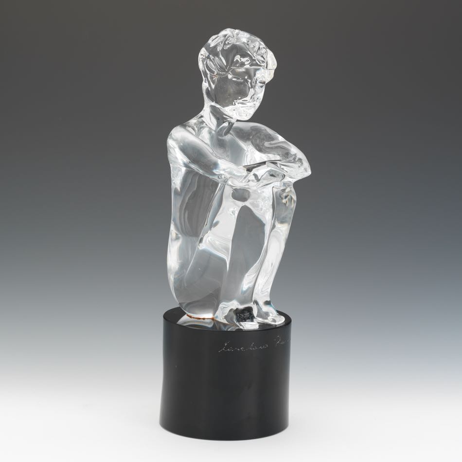 Loredano Rosin  (1936 - 1992)  15-1/2"Clear glass seated male, on round black glass base, artists