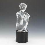 Loredano Rosin  (1936 - 1992)  15-1/2"Clear glass seated male, on round black glass base, artists