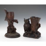 Two Black Forest Sculptures, German nullTwo carved wooden spill vases; the first of a winding tree