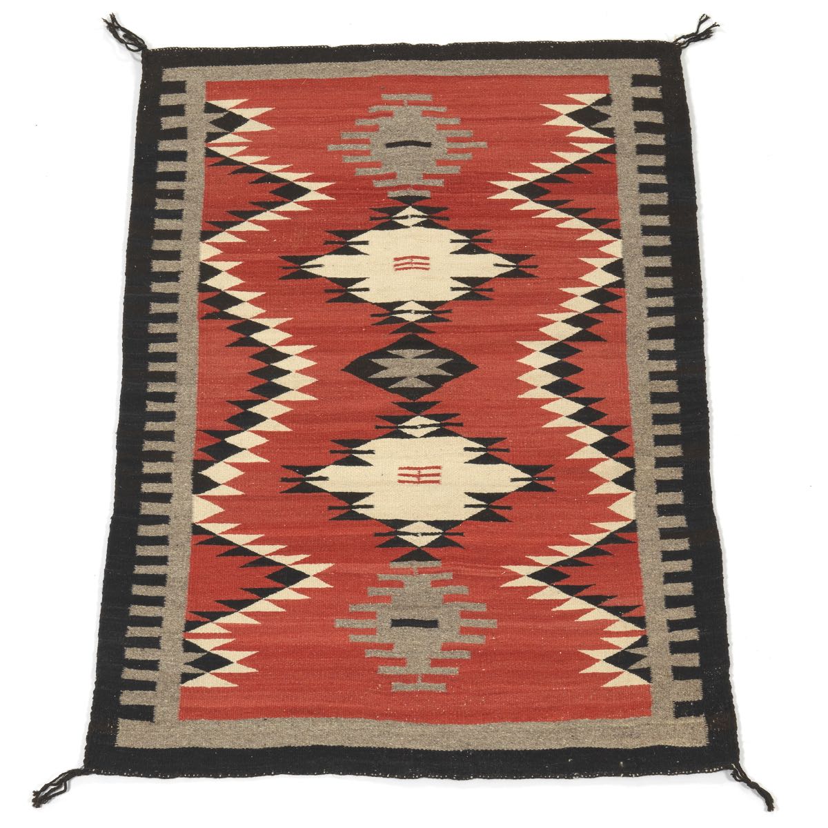 Navajo Saddle Blanket, ca. 1900-1940's 48-5/8" x 33-3/4"Homespun yarn of natural dyes including red,