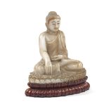 Carved Alabaster Figure of Buddha, 20th Century 23"Carved with painted details and gilt, seated on