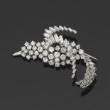 Diamond and Platinum Bird Brooch  2 x 1-1/4 in. Platinum mounted brooch in the shape of a bird,