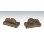 A Pair of Ceramic Recumbent Lions  2-5/8" x 4-7/8 x 2-1/4"Two ceramic lion figures with brown, stone