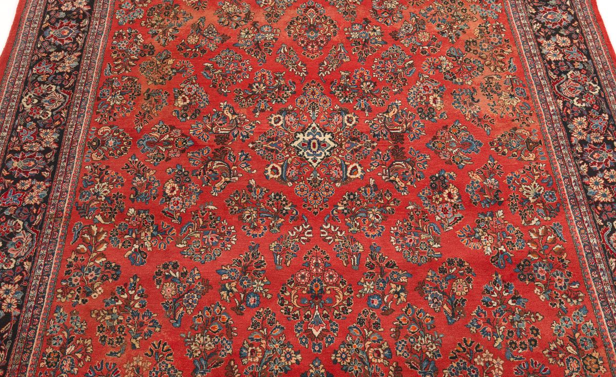 Sarouk Carpet, 20th Century 14'4" x 10'5"Wool on cotton weft. Thick pile, ground color red, floral - Image 2 of 2