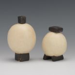 Leza Sullivan McVey (American, 1907-1984) 4", 2-7/8"Two egg-shaped cream-colored bottles with dark