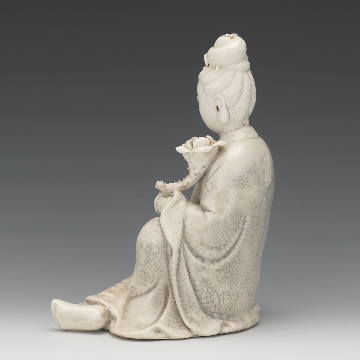 Blanc de Chine Figure of a Female 8-1/4" x 6-3/4" x 6"A white glazed figurine of a seated female - Image 4 of 7
