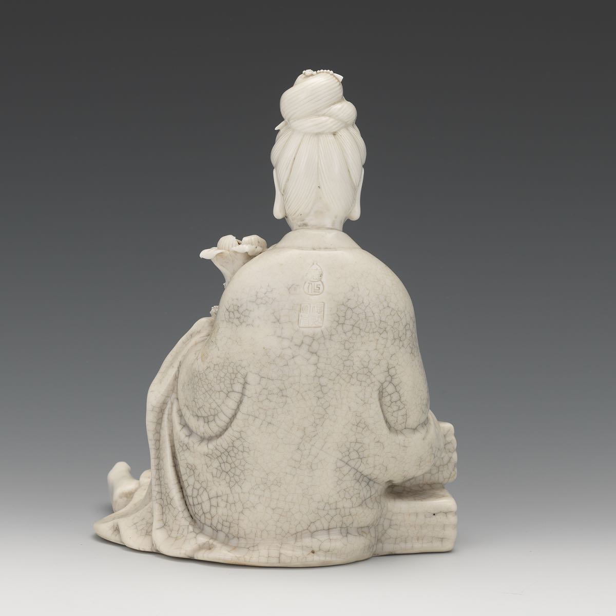 Blanc de Chine Figure of a Female 8-1/4" x 6-3/4" x 6"A white glazed figurine of a seated female - Image 3 of 7