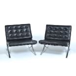 A Pair of "Barcelona" Chairs 30" x 30" x 32"Unknown maker, surface tufted black vinyl, foam