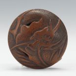 Manju Netsuke of a Dragon 2"Carved wood netsuke of a dragon; signed on the interior.  Online Bidding