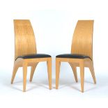 A Pair of Anigre Wood Side Chairs 3'3" x 1'4-1/2" x 2'1"Anigre wood chairs with removable covered
