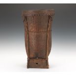 Japanese Ikebana Basket 21-1/2" x 12"A bamboo basket with a footed, square base and a round,