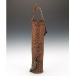 Japanese Bamboo Ikebana Basket 27"A tall, cylindrical weaved bamboo basket with twig decorations