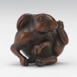 Carved Netsuke of a Rabbit 1-1/2" x 1-3/8"Carved and lacquered netsuke of a rabbit; signed on